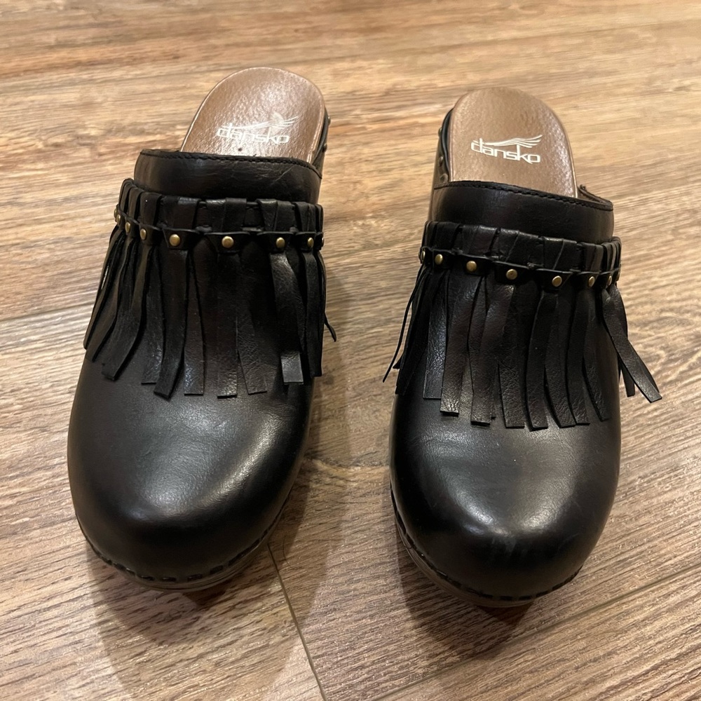 Dansko fringe clogs